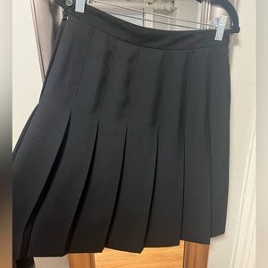 Knee length pleated skirt. Black. Super cute. Great condition